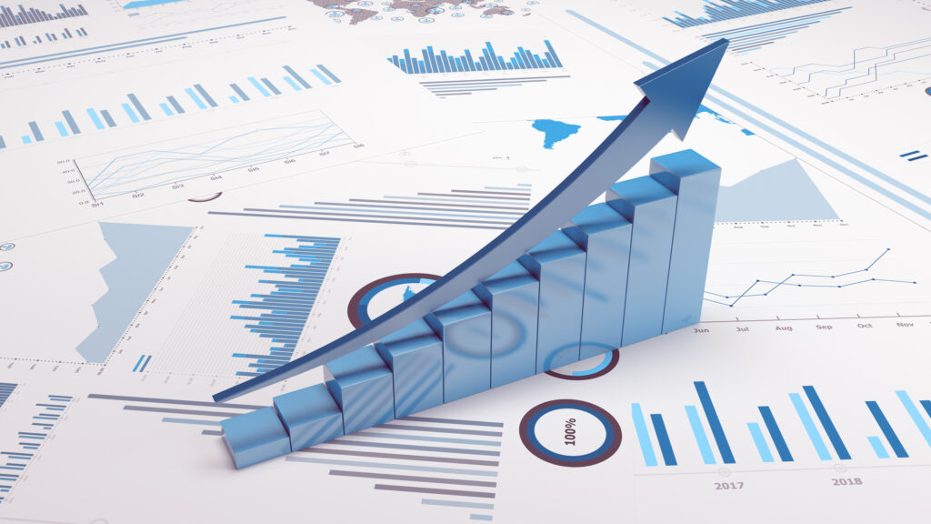 A graphic image showing a business trend graph and various other financial charts.